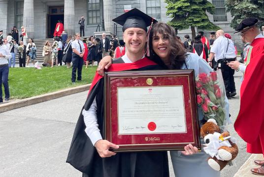 Student Maximilien Laviolette-Brassard with his mom