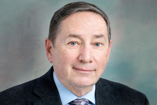 headshot of Jean Pierre Farmer