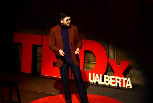 Saman Arfaie on TEDx stage