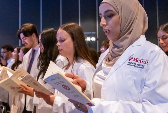 Students at white coat ceremony